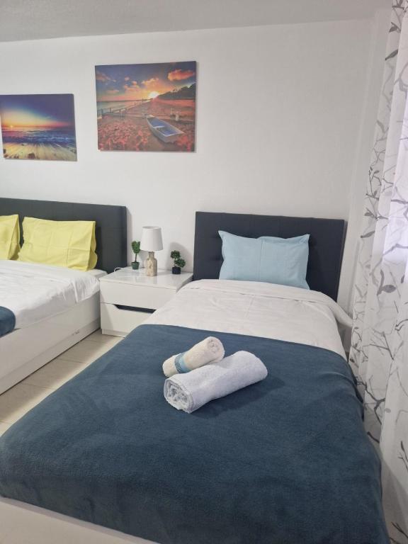 Postel nebo postele na pokoji v ubytování Pamys House