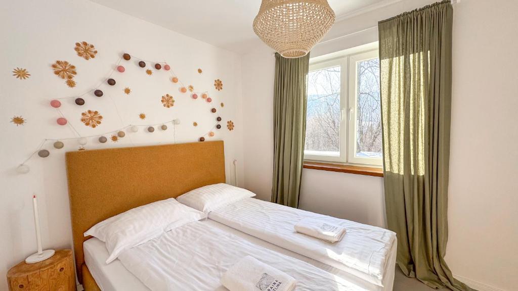 Postel nebo postele na pokoji v ubytování Kraina Wetlina