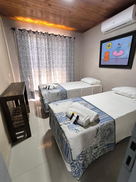 Postel nebo postele na pokoji v ubytování La Posada de Dante