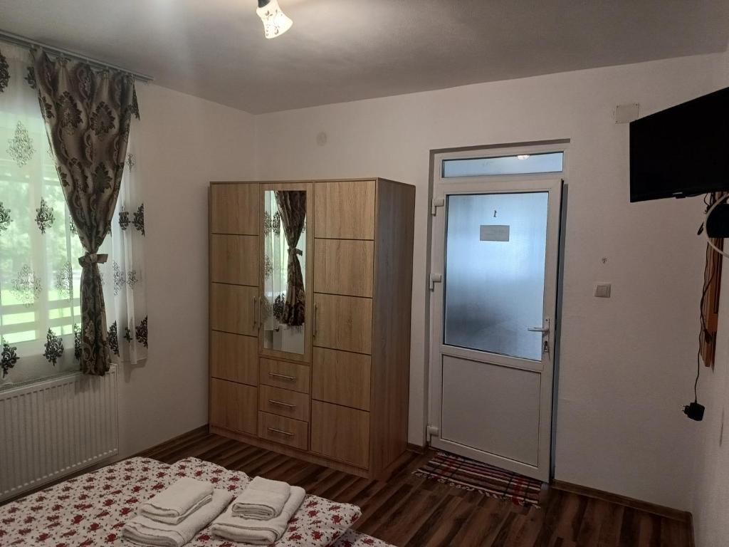 Postel nebo postele na pokoji v ubytování Cabana Colț de Rai