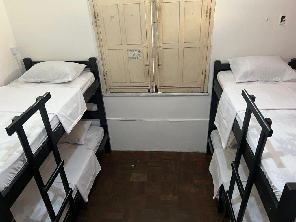 Postel nebo postele na pokoji v ubytování Calango Hostel