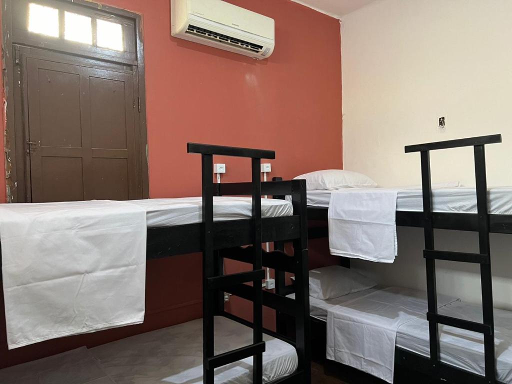 Postel nebo postele na pokoji v ubytování Calango Hostel