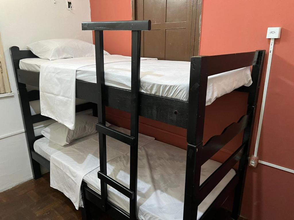 Postel nebo postele na pokoji v ubytování Calango Hostel