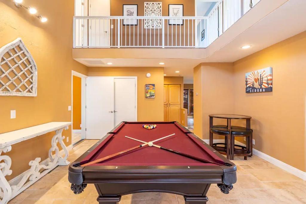 a pool table in a room with a ceiling at Flagstaff Family Retreat in Flagstaff