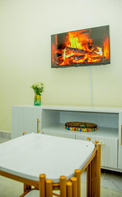 TV a/nebo společenská místnost v ubytování Tiny Haven executive one bedroom with free WIFI and Netflix