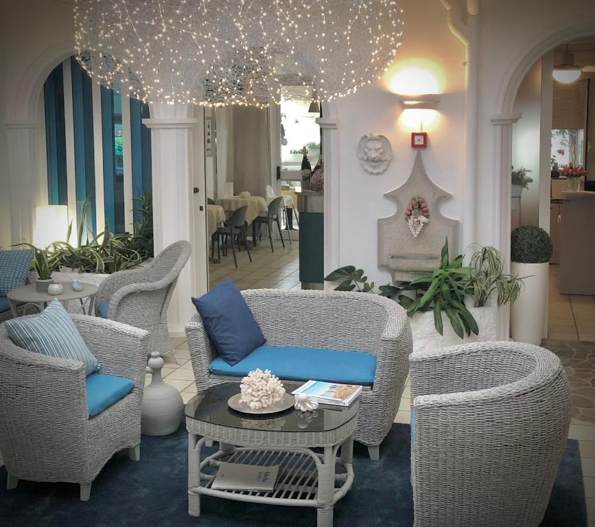 Posezení v ubytování Hotel La Parigina