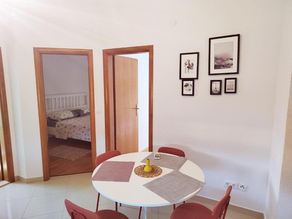 Postel nebo postele na pokoji v ubytování T&T Sea View Apartments