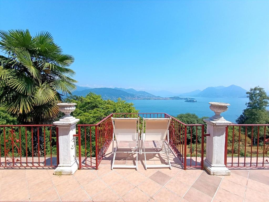 a balcony with a view of the water at La Mulattiera - vista lago in Baveno