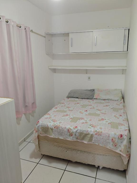 Postel nebo postele na pokoji v ubytování Casa em Guriri para temporada