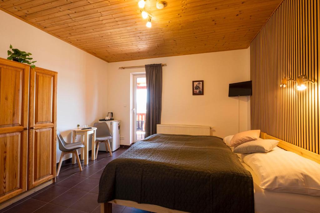 Postel nebo postele na pokoji v ubytování Panorama Kobylnice