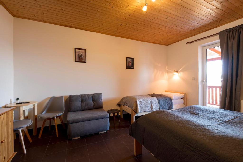 Postel nebo postele na pokoji v ubytování Panorama Kobylnice