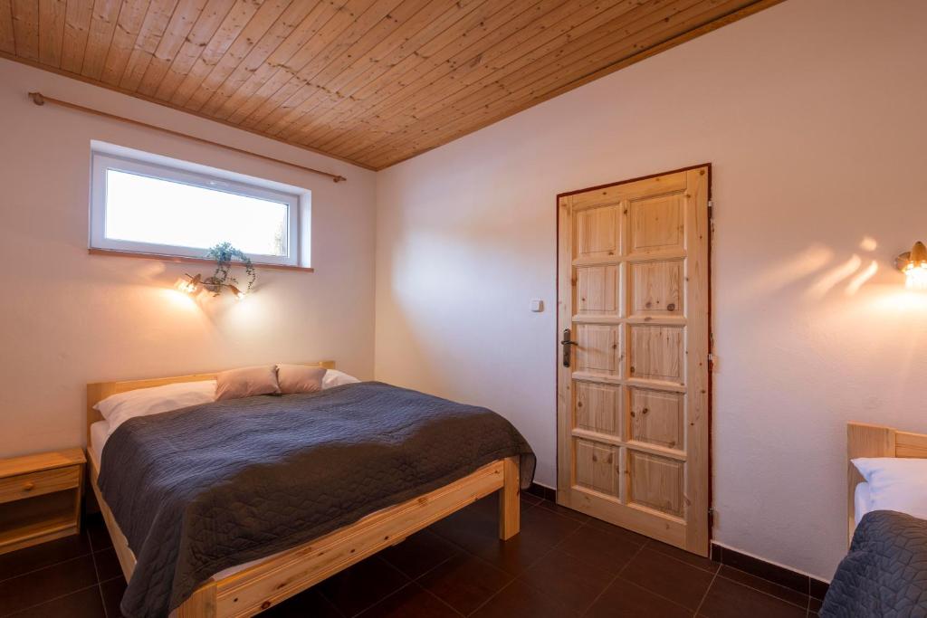 Postel nebo postele na pokoji v ubytování Panorama Kobylnice