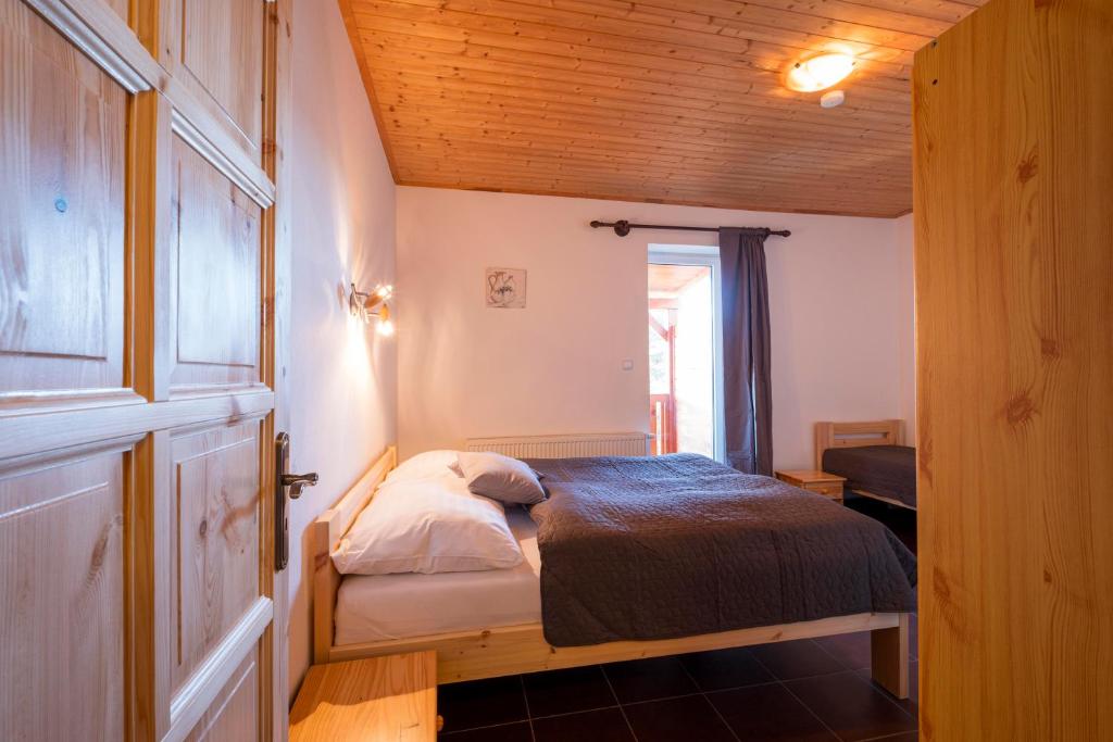 Postel nebo postele na pokoji v ubytování Panorama Kobylnice