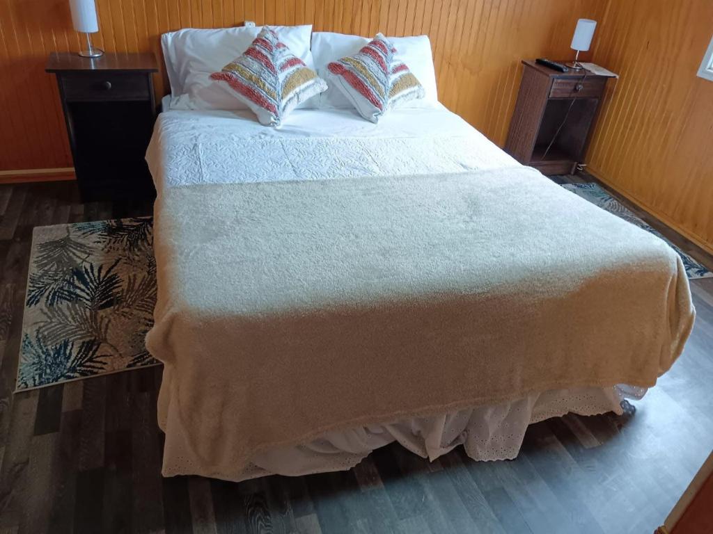 Postel nebo postele na pokoji v ubytování Hostal Reymar