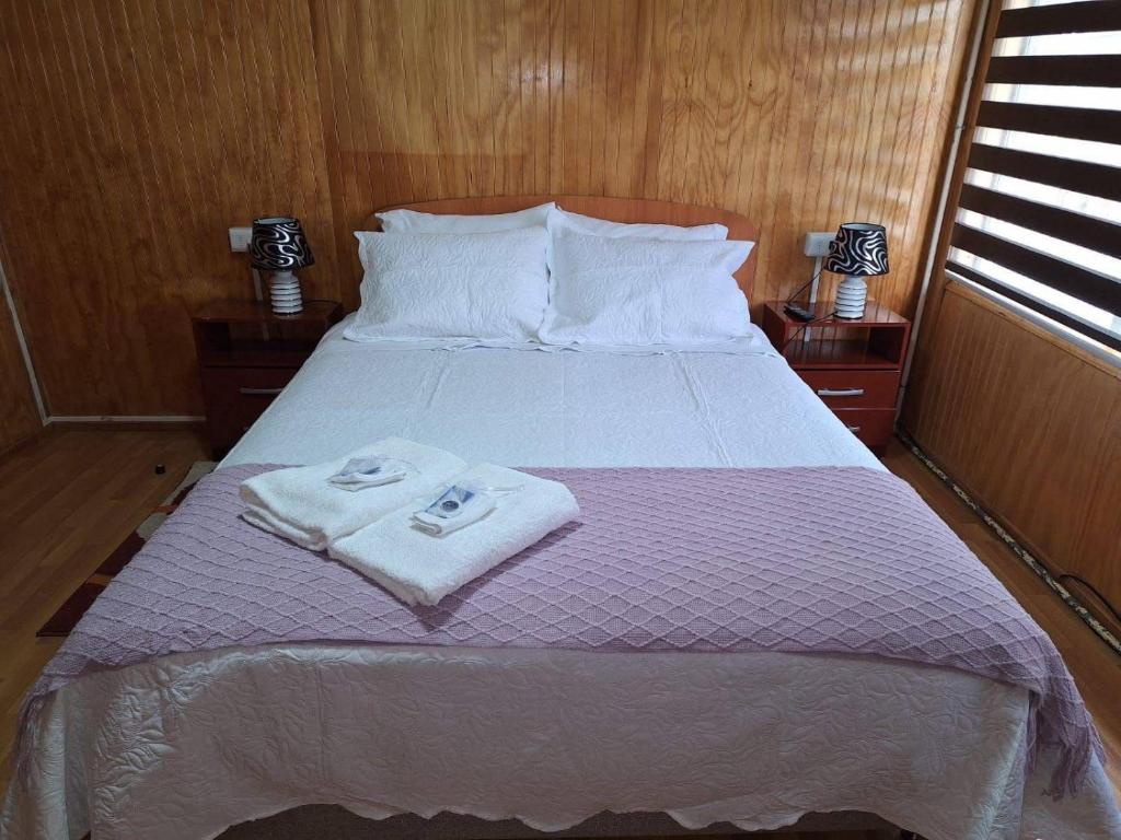 Postel nebo postele na pokoji v ubytování Hostal Reymar