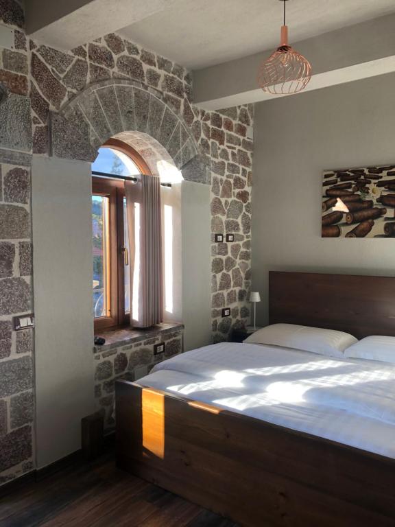 Postel nebo postele na pokoji v ubytování Vila Janko