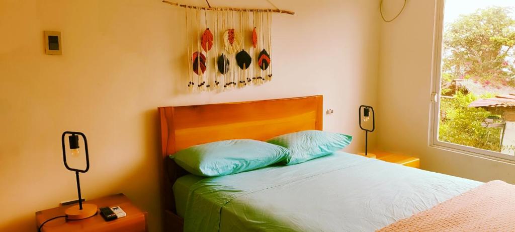 Postel nebo postele na pokoji v ubytování Café Madame