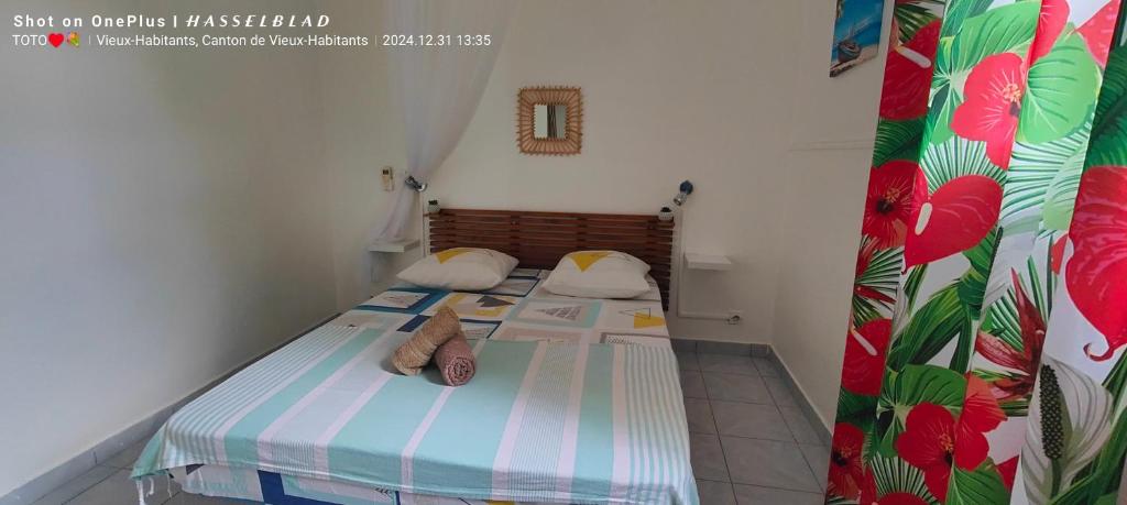 Postel nebo postele na pokoji v ubytování Luketo
