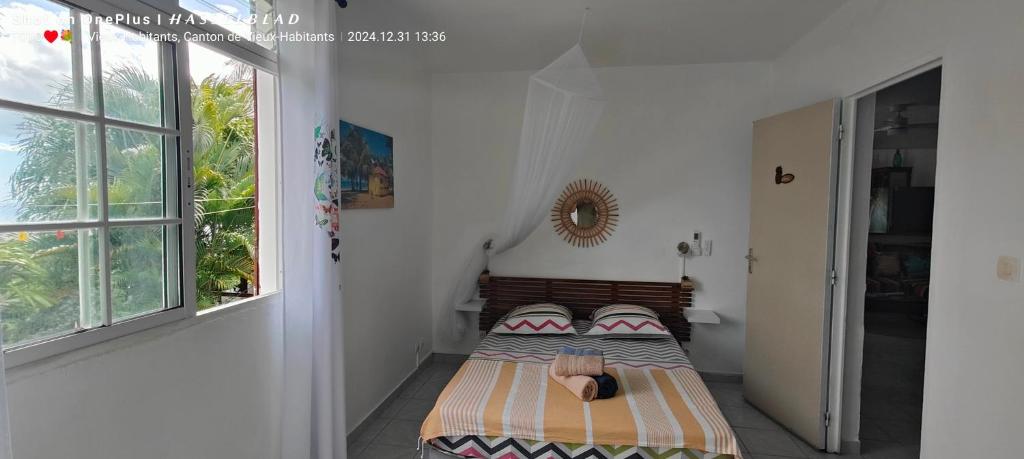 Postel nebo postele na pokoji v ubytování Luketo