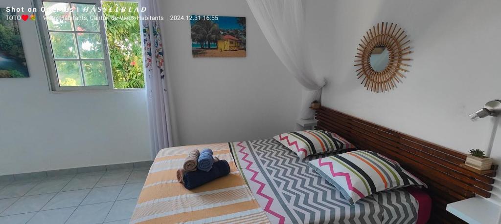 Postel nebo postele na pokoji v ubytování Luketo