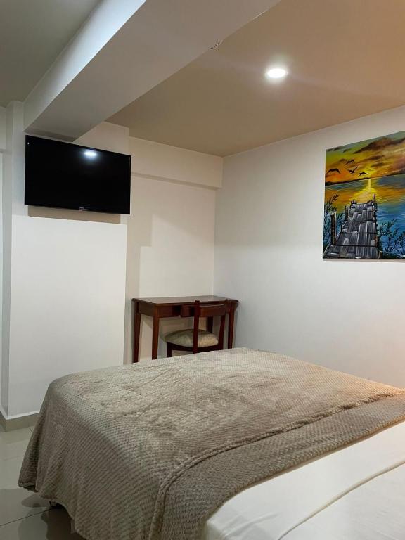 Postel nebo postele na pokoji v ubytování Fortune Hotel