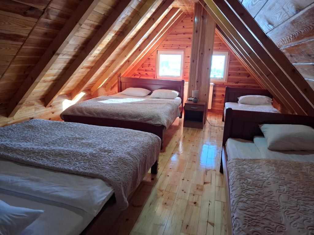 Postel nebo postele na pokoji v ubytování Apartmani Prisoje