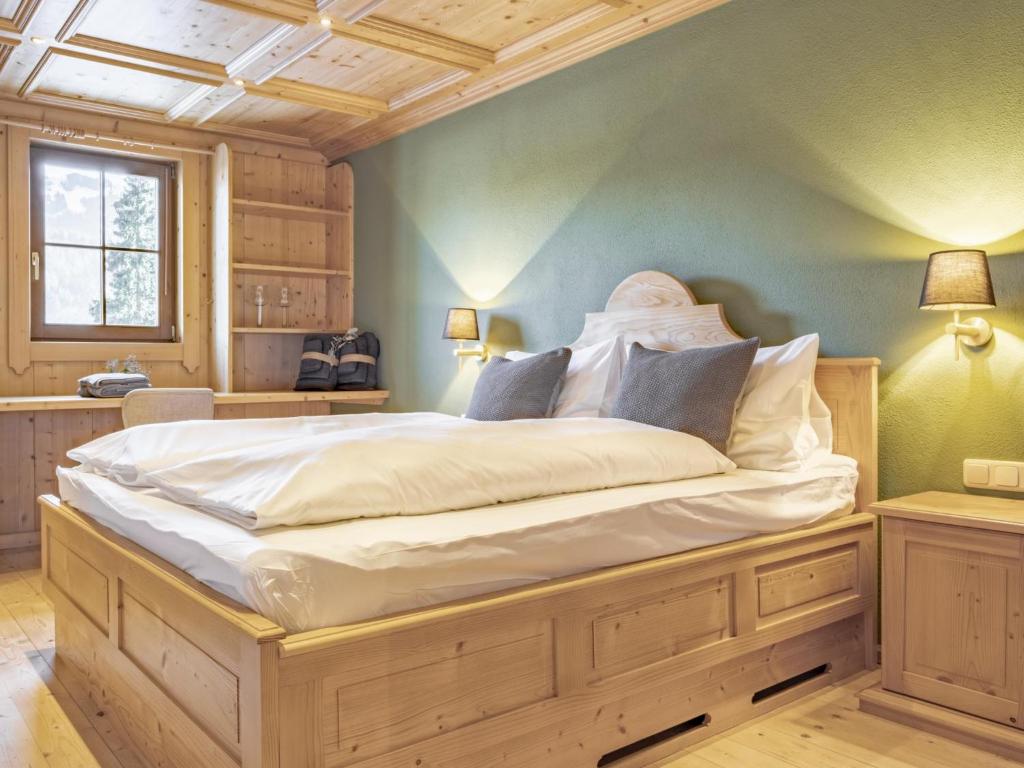 Postel nebo postele na pokoji v ubytování Kitz Hills Chalet Mondschein