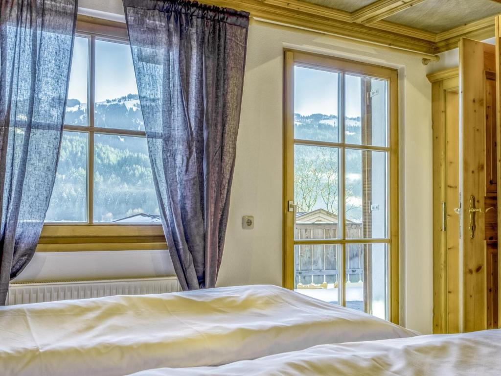 Postel nebo postele na pokoji v ubytování Kitz Hills Chalet Mondschein