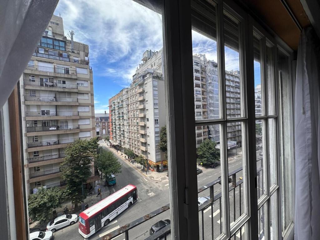 a view from a window of a city with a bus at Amplio depto de 2 habitaciones céntrico muy buena ubicacion in Mar del Plata