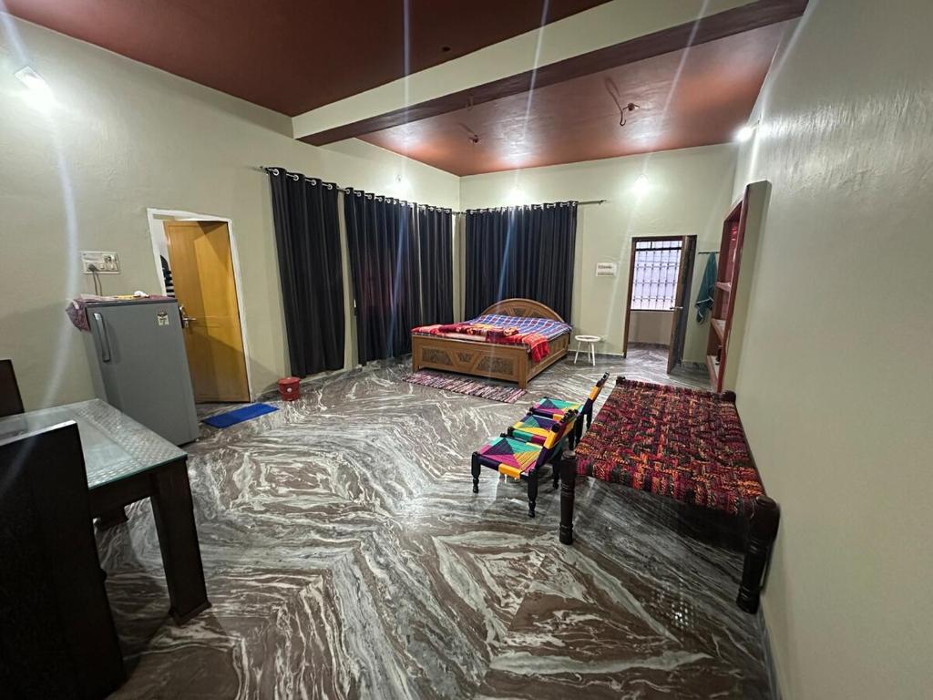 Postel nebo postele na pokoji v ubytování Village Homestay