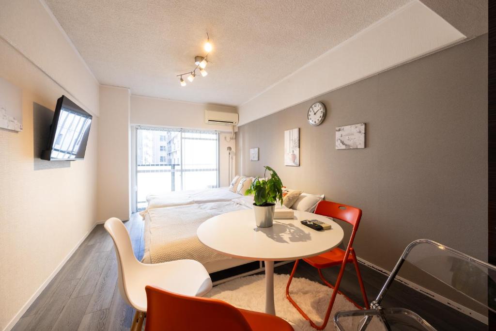 Μια τηλεόραση ή/και κέντρο ψυχαγωγίας στο urban stay 博多-博多駅徒歩6分-Wi-fi完備2タイプ