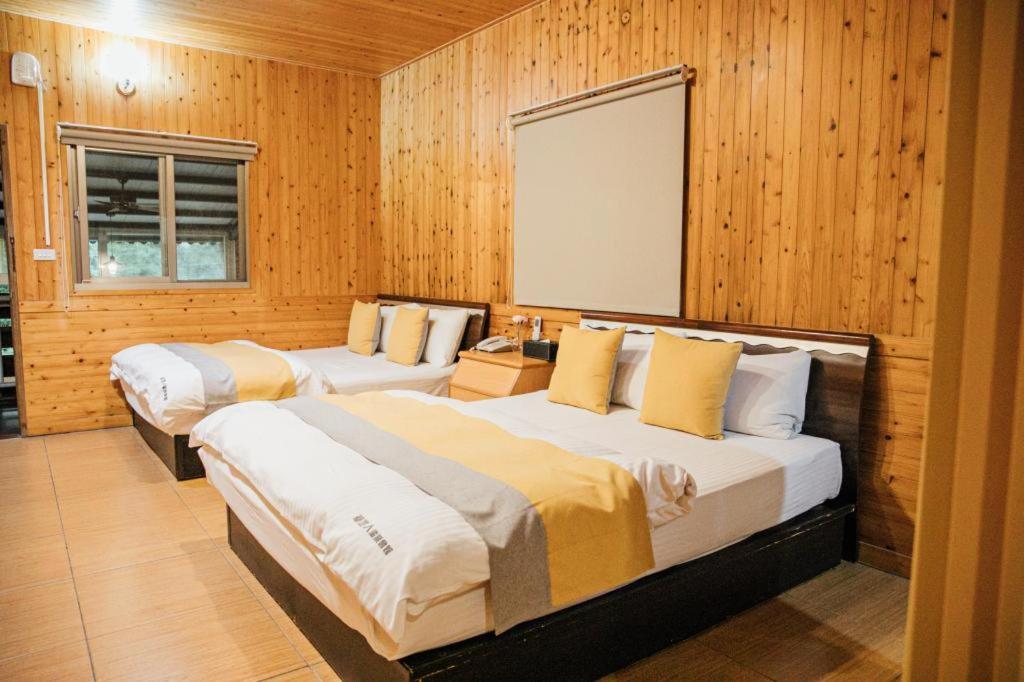 Postel nebo postele na pokoji v ubytování CDR Hotspring Resort