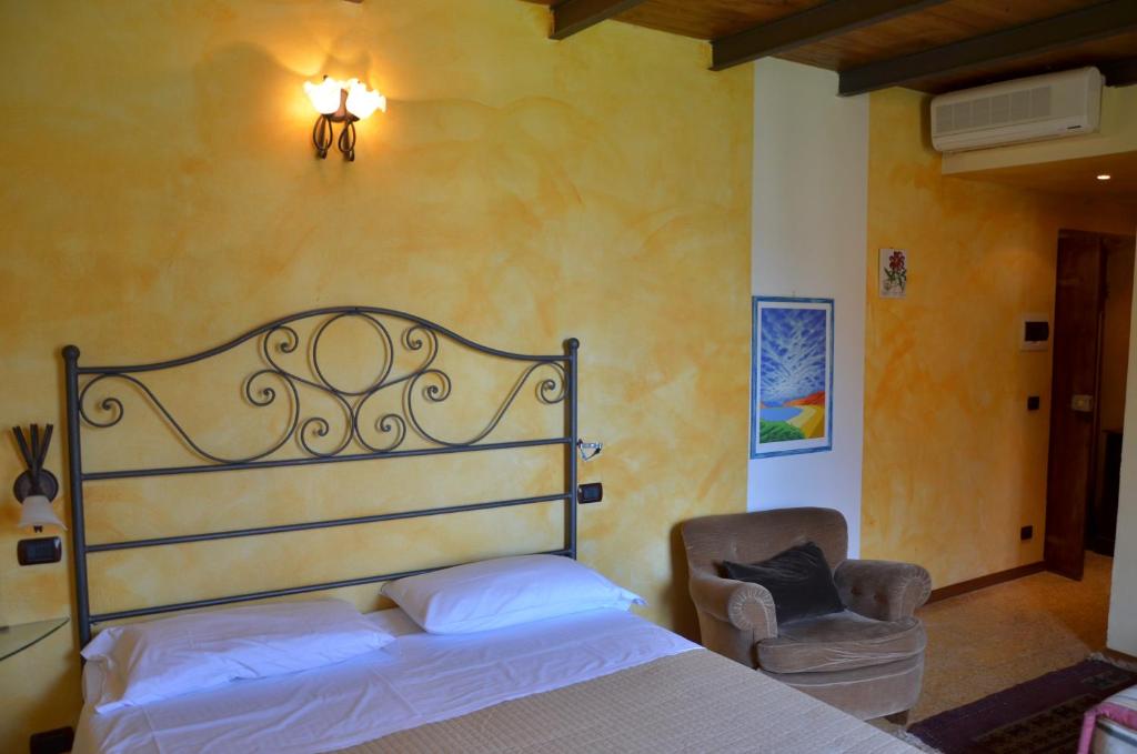 Postel nebo postele na pokoji v ubytování Locanda Dal Moccia