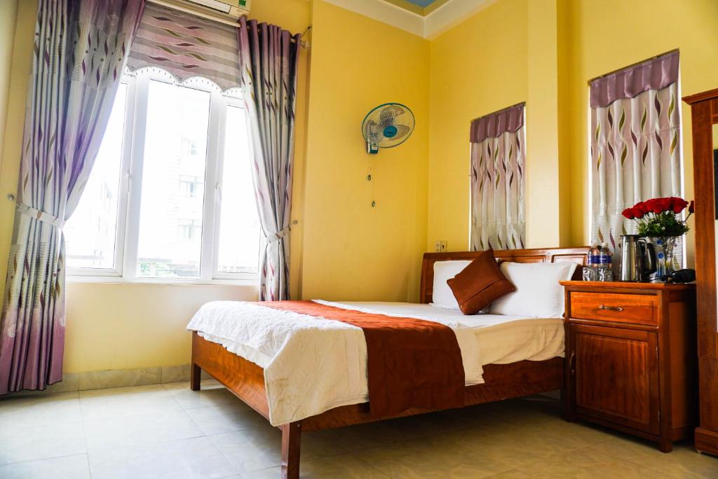 Postel nebo postele na pokoji v ubytování Phong Nha Orient Homestay