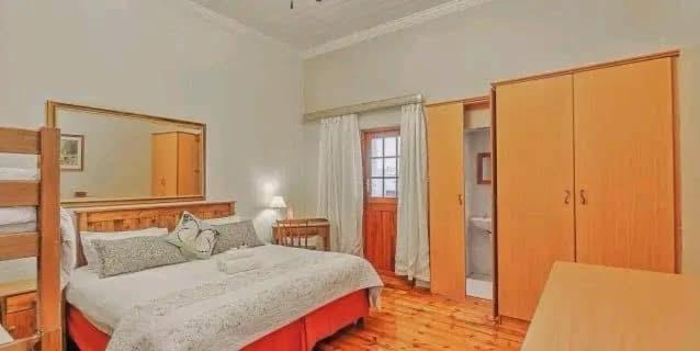 Voodi või voodid majutusasutuse Wampex Guest House In Port Elizabeth R400 Night toas