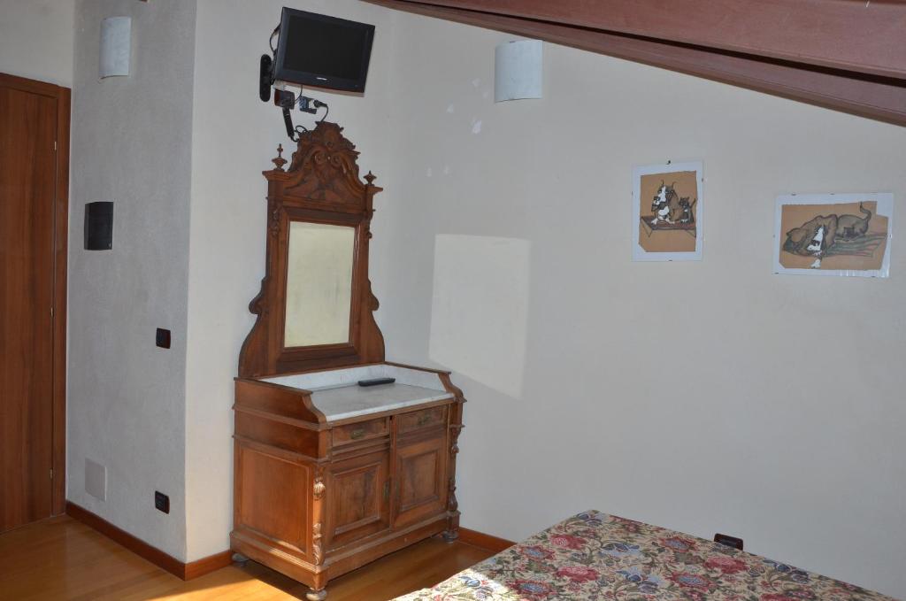 TV a/nebo společenská místnost v ubytování Locanda Dal Moccia