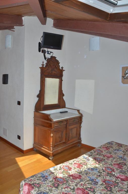 TV a/nebo společenská místnost v ubytování Locanda Dal Moccia