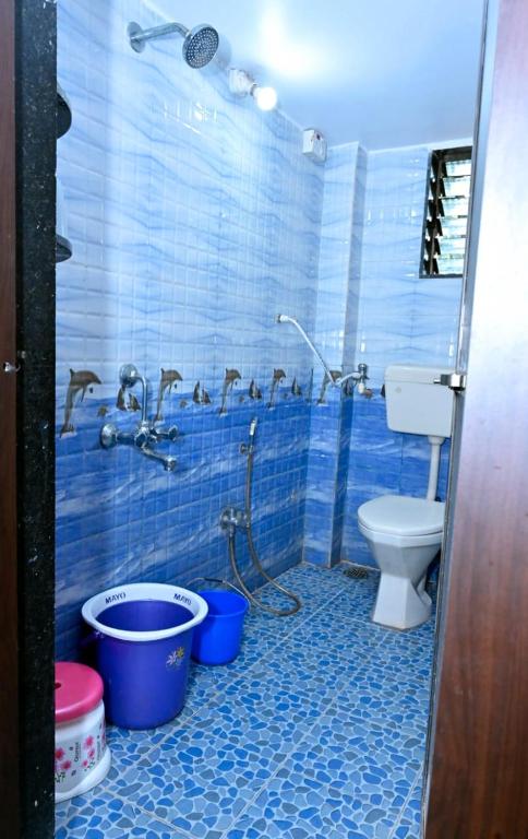 Koupelna v ubytování Sneh Beach Homestay - Wayangani Vengurla