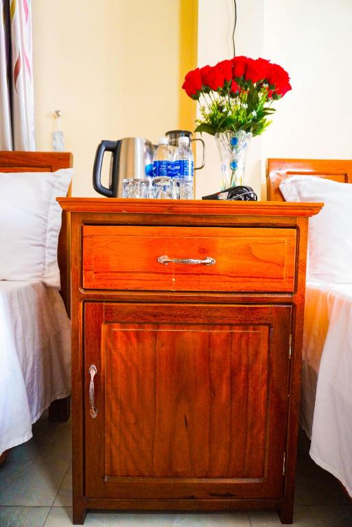 Postel nebo postele na pokoji v ubytování Phong Nha Orient Homestay