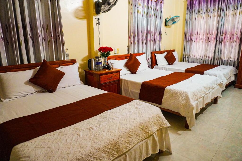 Postel nebo postele na pokoji v ubytování Phong Nha Orient Homestay