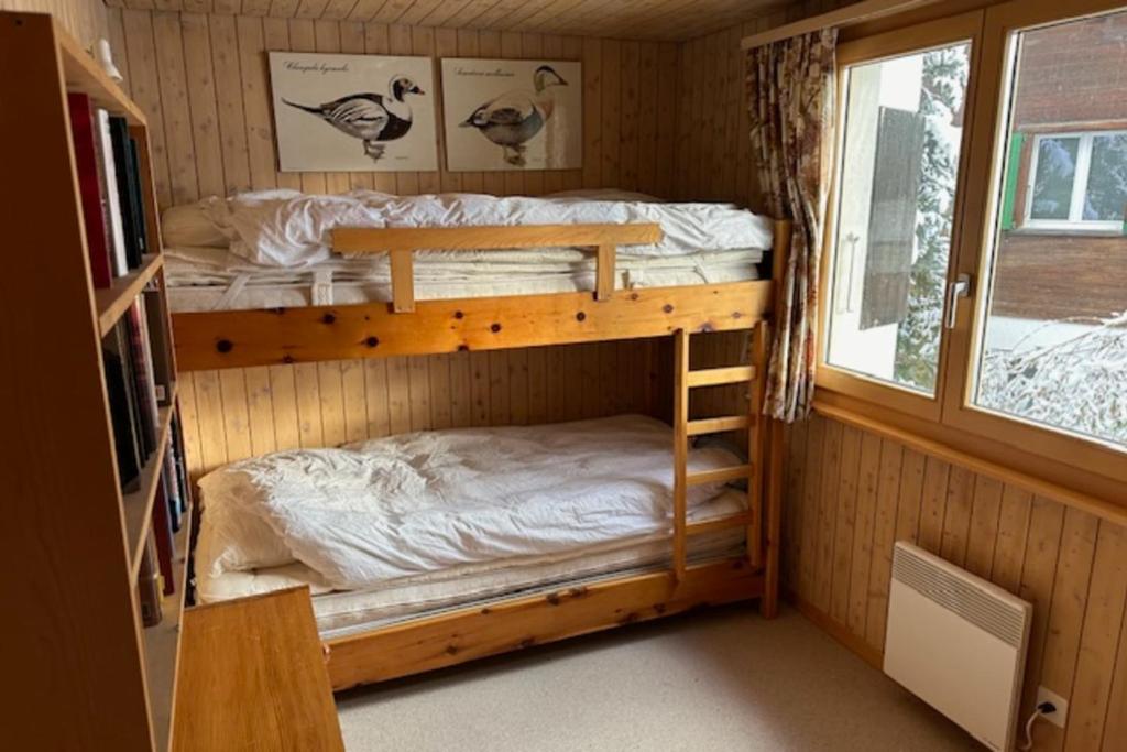 Postel nebo postele na pokoji v ubytování Chalet Arnica