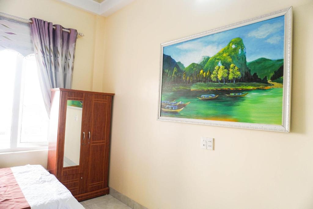 Postel nebo postele na pokoji v ubytování Phong Nha Orient Homestay