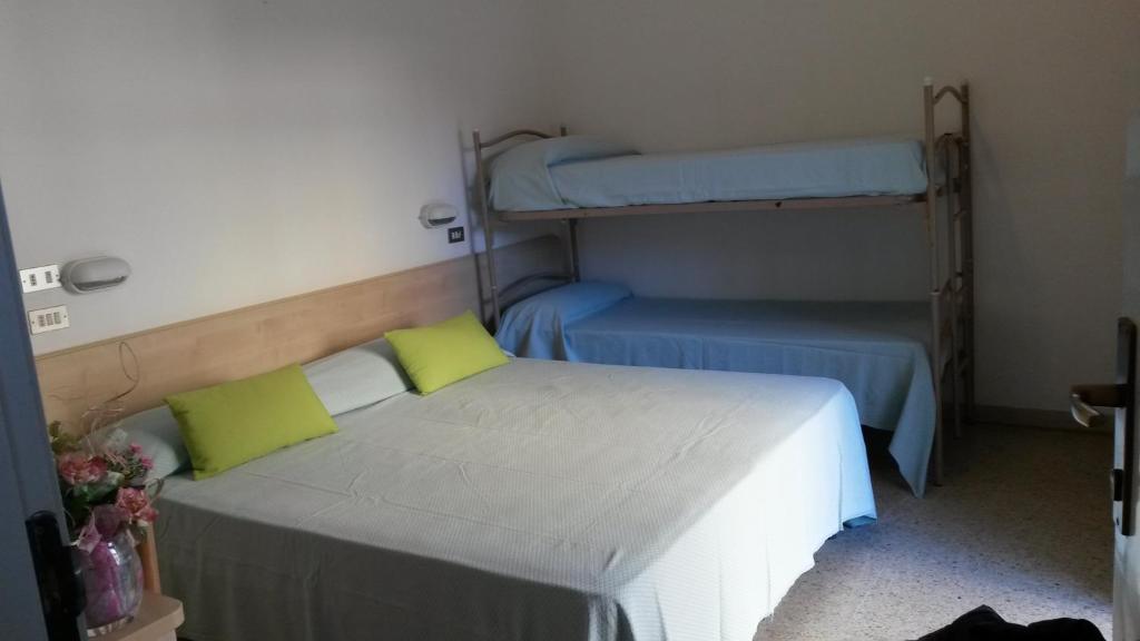 Postel nebo postele na pokoji v ubytování Hotel Niagara