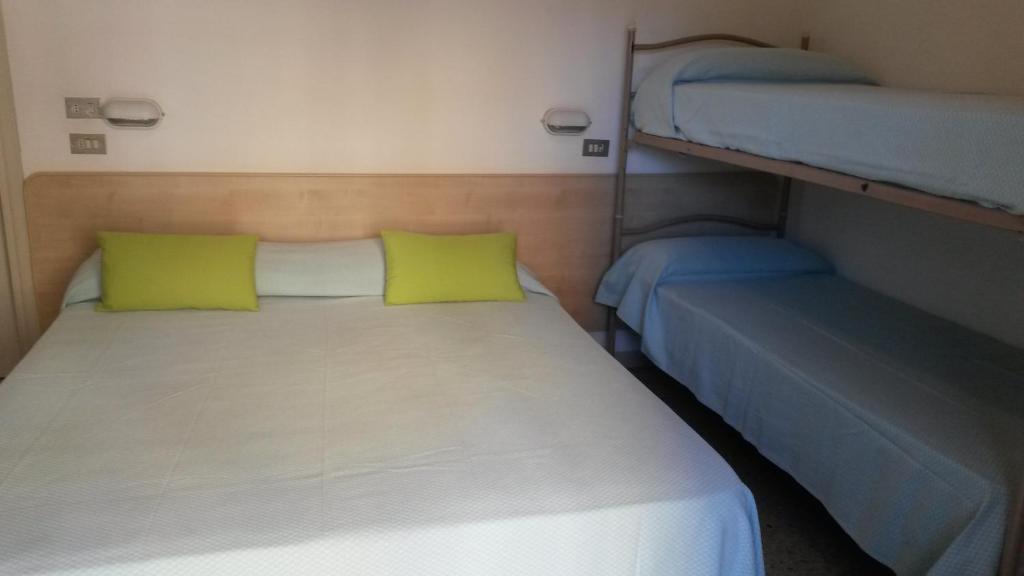 Postel nebo postele na pokoji v ubytování Hotel Niagara