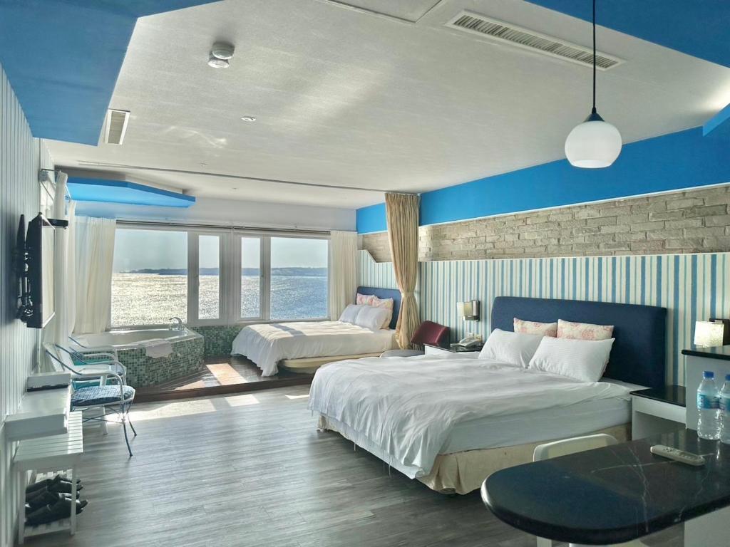 Letto o letti in una camera di 南灣飯店 Kenting Nanwan Hotel