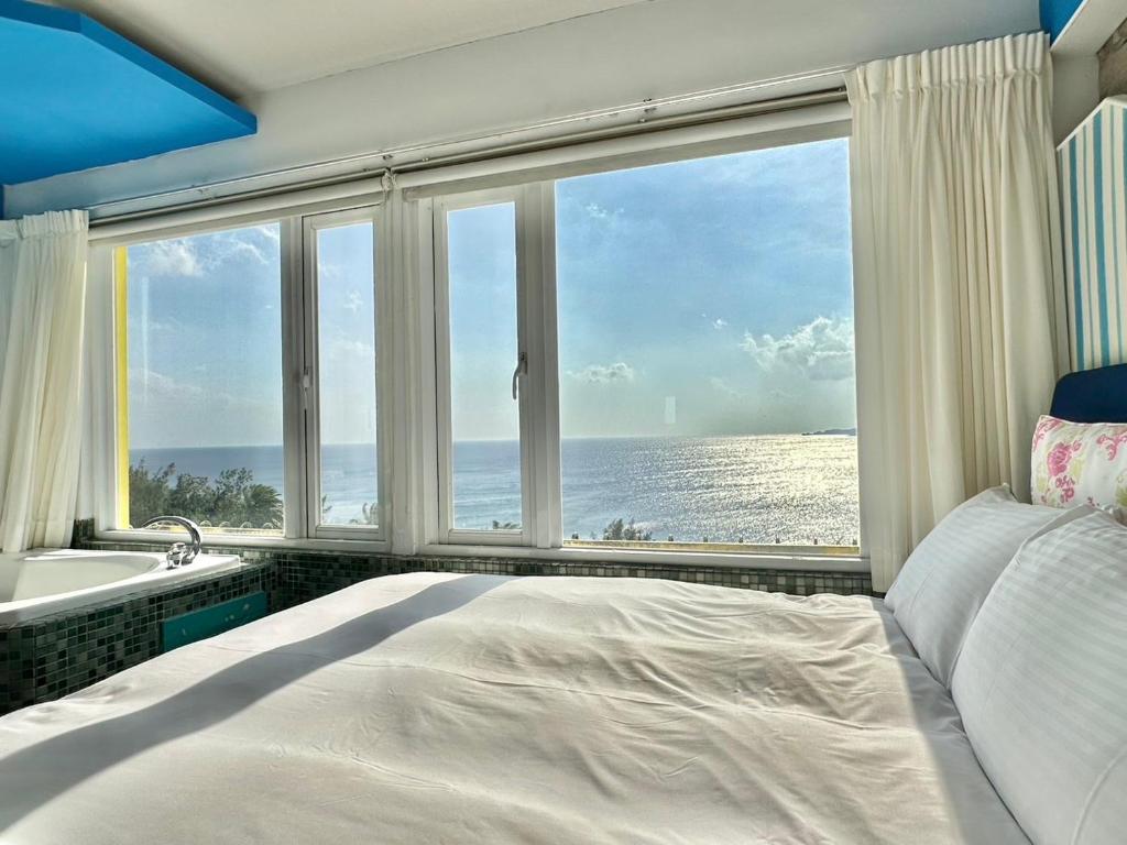 Letto o letti in una camera di 南灣飯店 Kenting Nanwan Hotel
