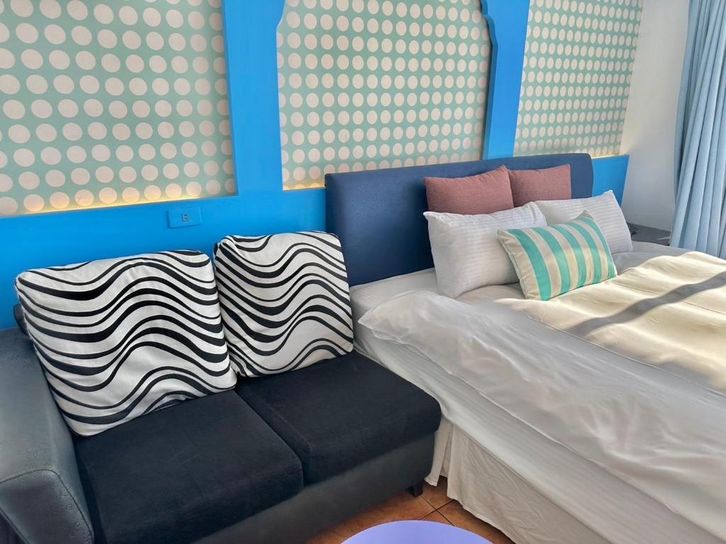 Letto o letti in una camera di 南灣飯店 Kenting Nanwan Hotel
