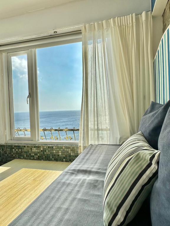 Letto o letti in una camera di 南灣飯店 Kenting Nanwan Hotel