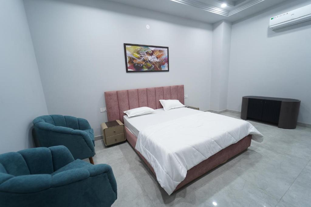 Postel nebo postele na pokoji v ubytování Crazzy Days Hotel I Sonipat