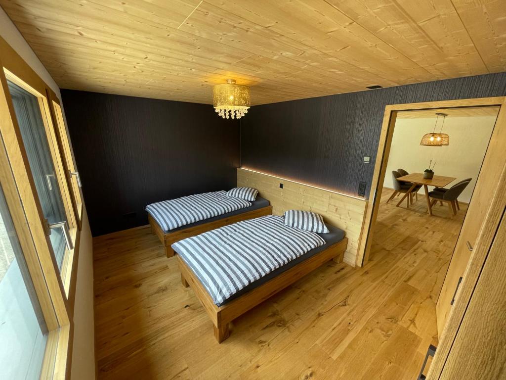 Postel nebo postele na pokoji v ubytování Bergblick Apartments - Weisshorn